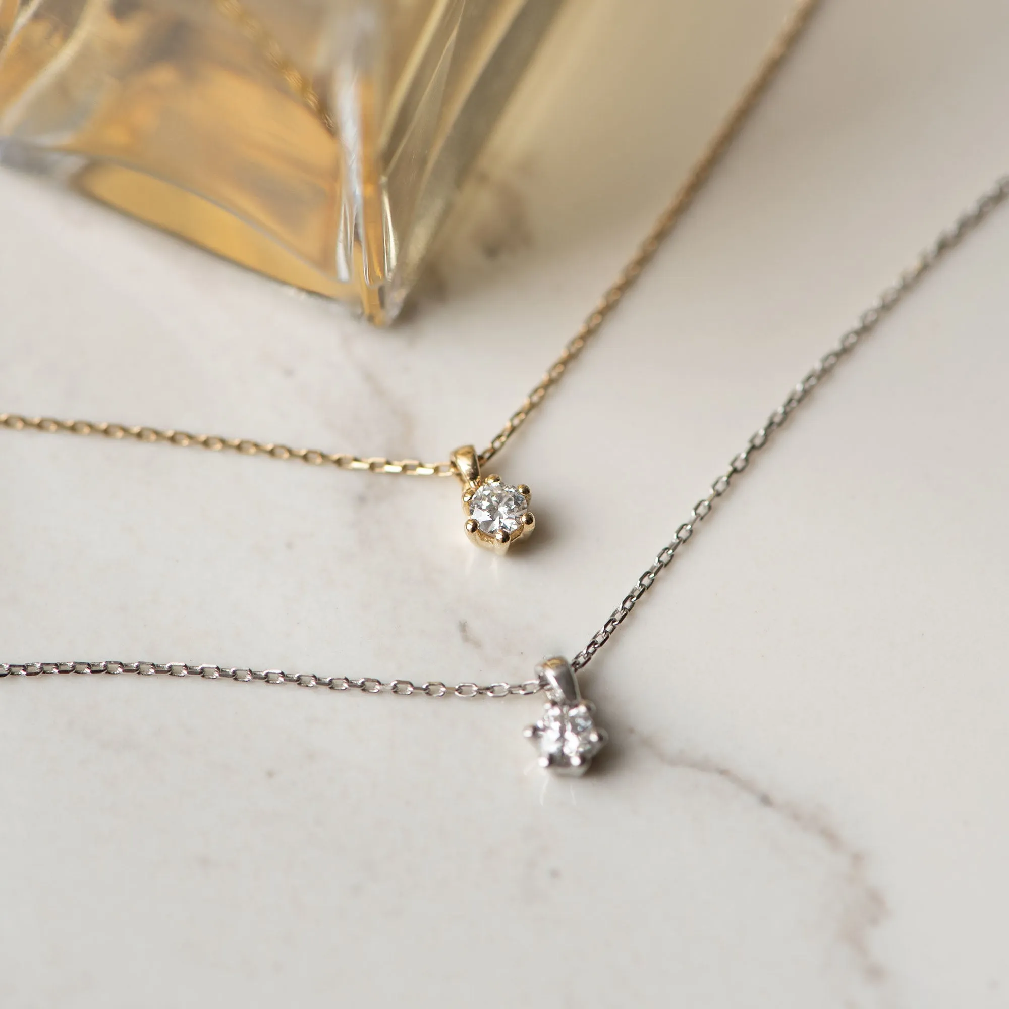 De la Paix Céline 14 karat gold necklace with diamond 0.05 carat