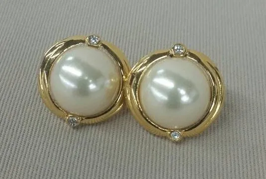 Faux pearl round clip on earrings with rhinestone accents
